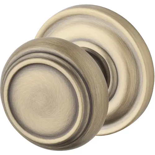 Passage Traditional Knob and Traditional Round Rose with 6AL Latch and Dual Strike Matte Brass and Black Finish Passage Traditional Knob and Traditional Round Rose with 6AL Latch and Dual Strike Matte Brass and Black Finish