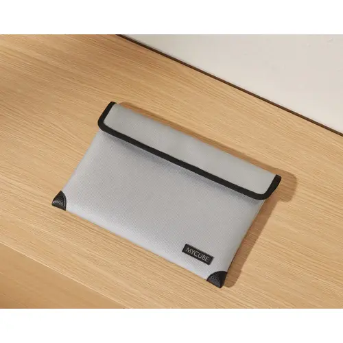 Bag, MyCube, Fireproof Silver colored Small (8.3" H x 11" W) Fiberglass, small silver bag Double-layered silicone-coated fiberglass Bag, MyCube, Fireproof Silver colored Small (8.3" H x 11" W) Fiberglass, small silver bag Double-layered silicone-coated fiberglass