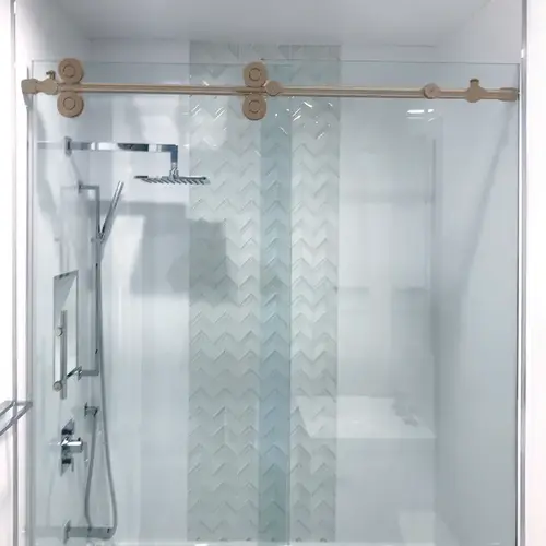 Clearwater Series Sliding Shower Door System for 3/8" or 1/2" Glass - Brushed Bronze GLASS NOT INCLUDED Clearwater Series Sliding Shower Door System for 3/8" or 1/2" Glass - Brushed Bronze GLASS NOT INCLUDED