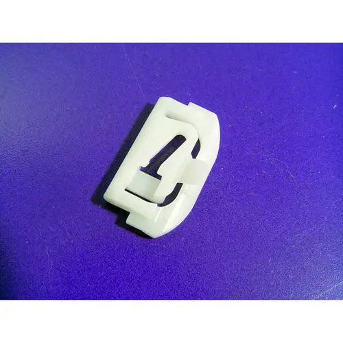 Lower Side Window Reveal Molding Clip. Made of nylon Lower Side Window Reveal Molding Clip. Made of nylon