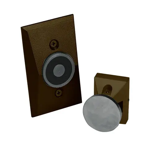 Completely Flush Mounted Dual Voltage 24 Volt DC and 120 Volt AC Electromagnetic Door Holder Dark Bronze Finish Completely Flush Mounted Dual Voltage 24 Volt DC and 120 Volt AC Electromagnetic Door Holder Dark Bronze Finish