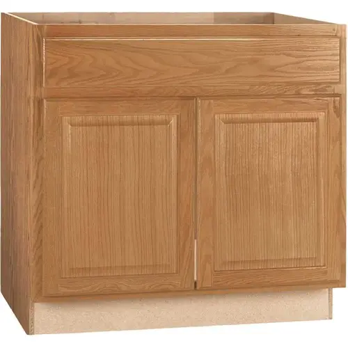 Hampton Medium Oak Raised Panel Stock Assembled Sink Base Kitchen Cabinet (36 in. x 34.5 in. x 24 in.) Hampton Medium Oak Raised Panel Stock Assembled Sink Base Kitchen Cabinet (36 in. x 34.5 in. x 24 in.)
